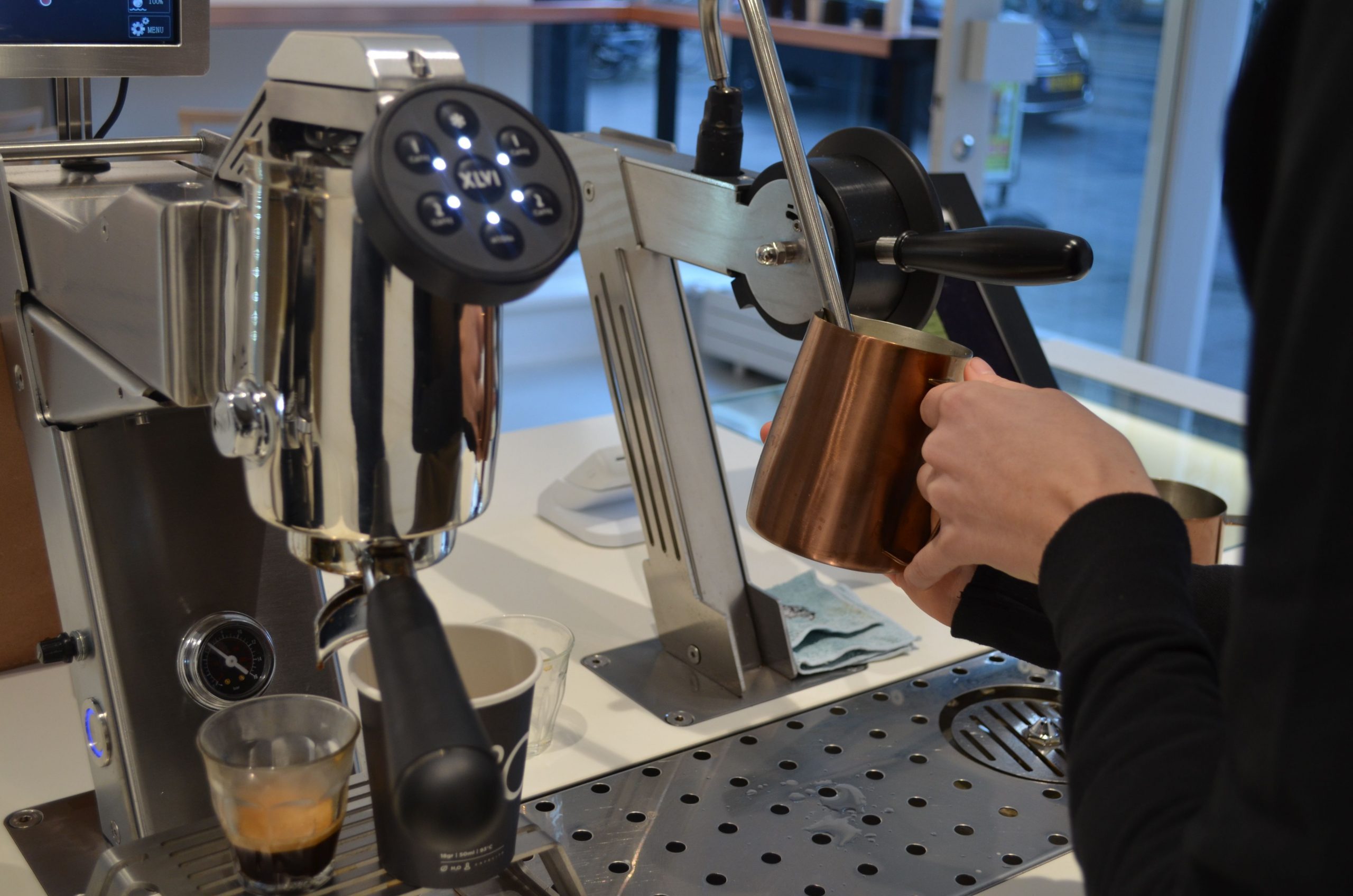 Espressobar Amsterdam, coffee machine in use